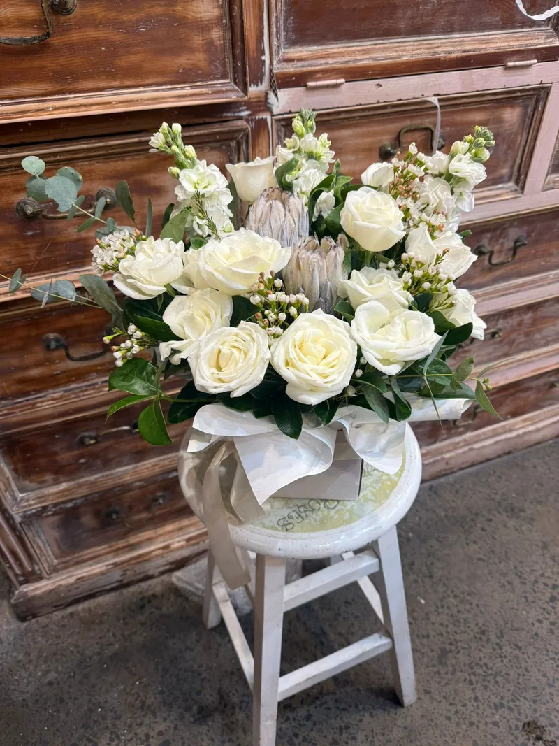 Floral Arrangement with Protea arranged by floraldesigns, St Peters