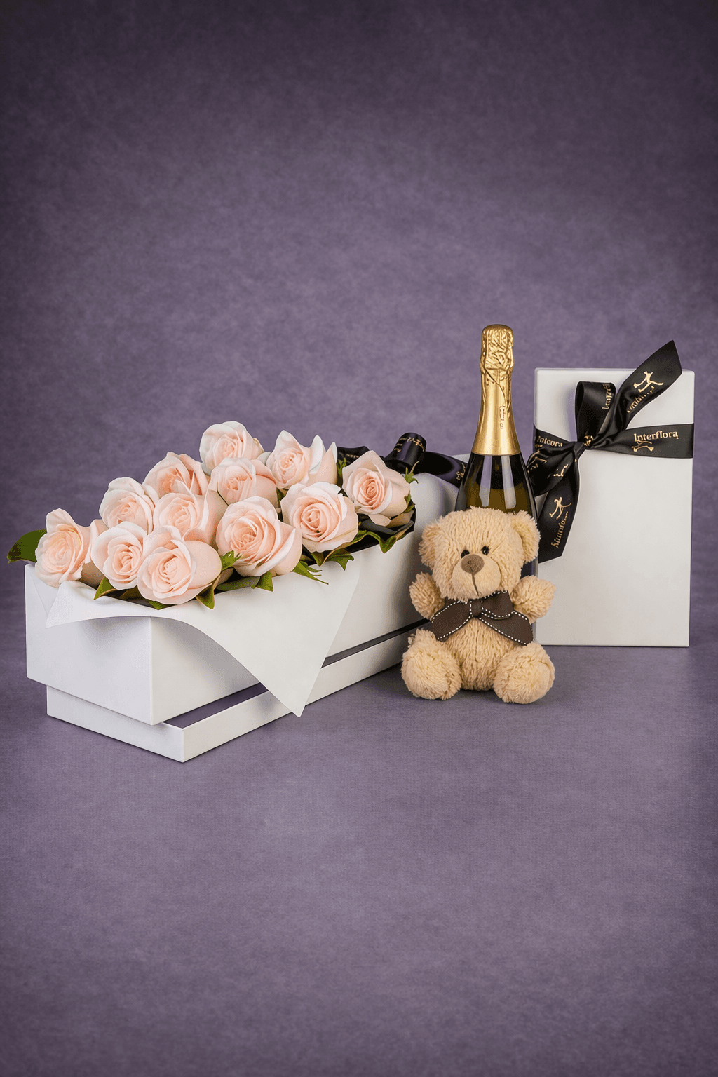 Elegant Gift Display with Roses and Wine